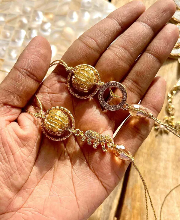 Elephant_Mercedes_Stones_And_Gold_Thread_Couple_Rakhi