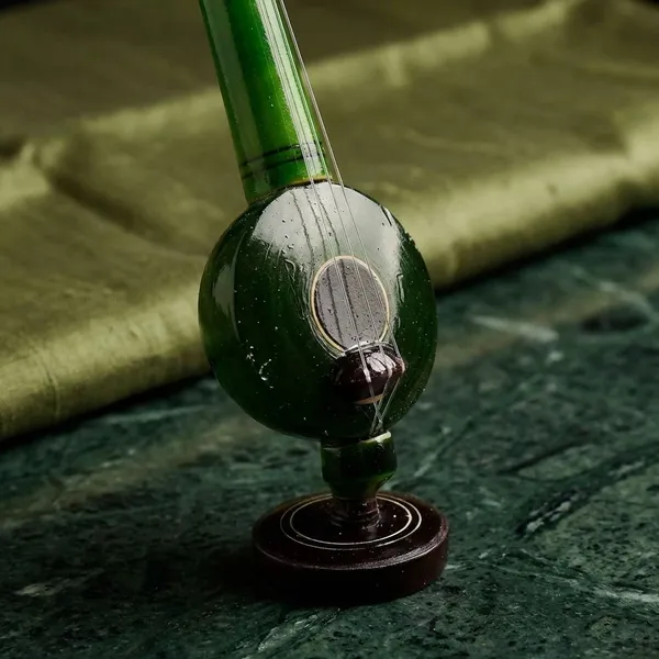 Green_Wooden_Veena_Musical_Instrument_Toy