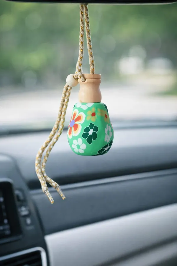 Floral_Hanging_Car_Air_Freshener_With_Wooden_Cap_And_Braided_Rope