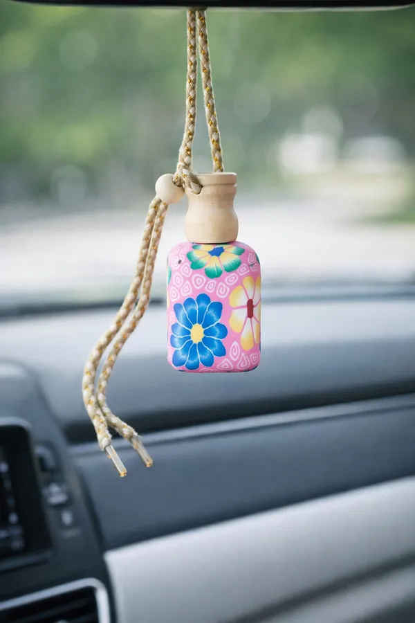Decorative_Perfume_With_Floral_Design_And_Hanging_Cord_And_Floral_Car_Air_Freshener_With_Wooden_Cap_Pack_Of_2