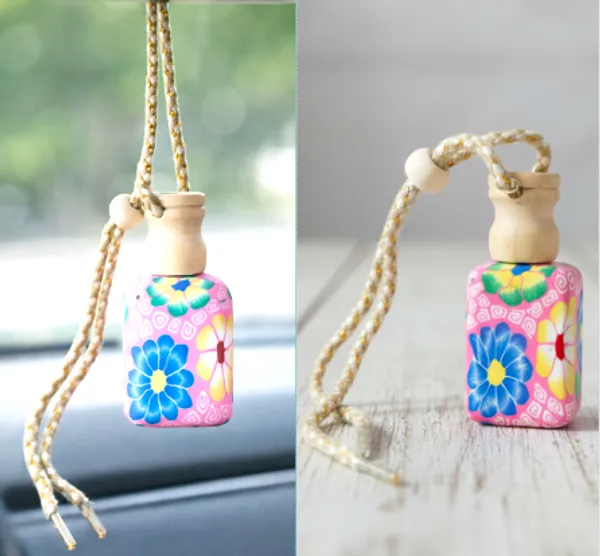Decorative_Perfume_With_Floral_Design_And_Hanging_Cord_And_Floral_Car_Air_Freshener_With_Wooden_Cap_Pack_Of_2