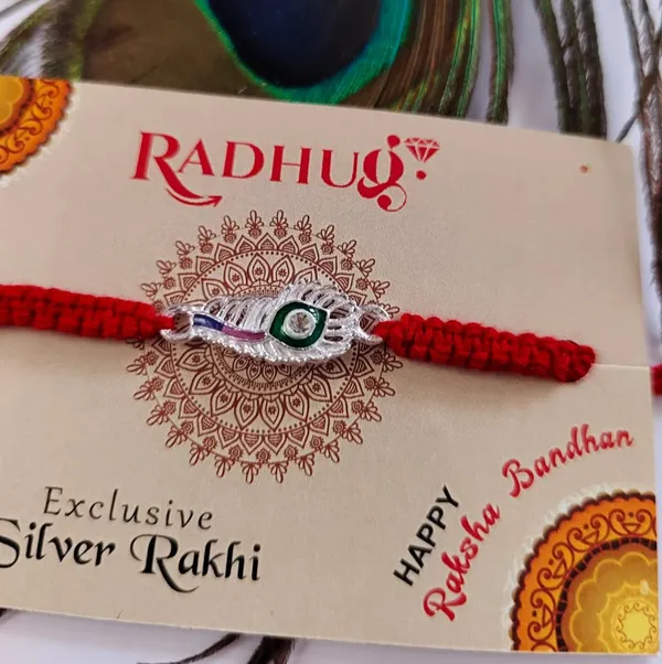 Pack_Of_1_Sterling_Silver_Mor_Pankh_Charm_Red_Thread_Rakhi