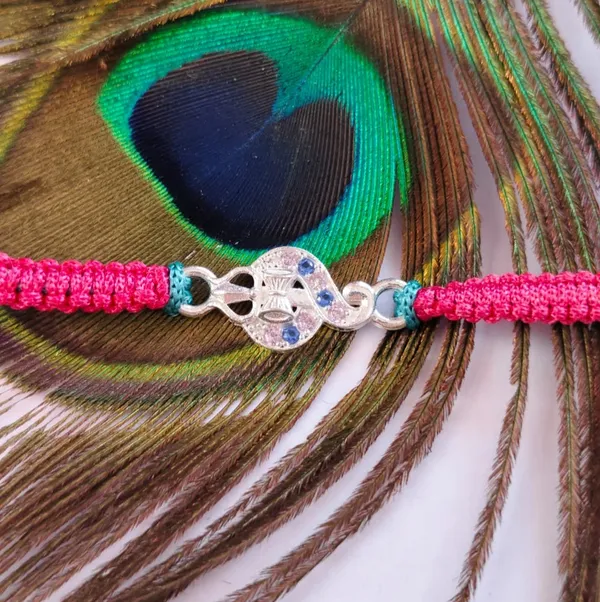 Pack_Of_1_Silver_Trishul_Damru_Charm_Pink_Blue_Braided_Thread_Rakhi