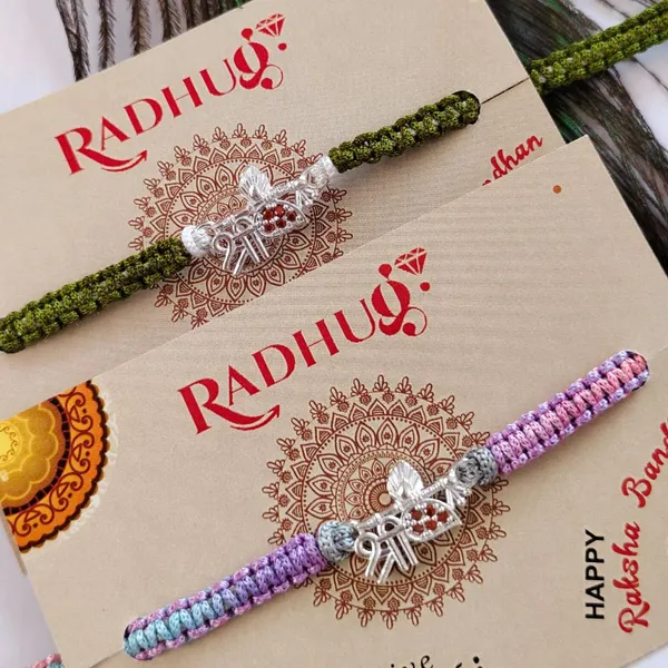 Silver_Bansuri_Shree_Red_Stone_Charm_Thread_Rakhi_(Single_Piece)