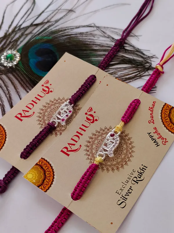 Silver_Ram_Charm_Maroon_Pink_Thread_Assorted_Rakhi_(Single_Piece)