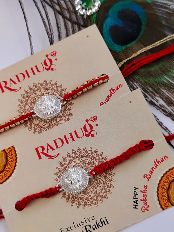 Silver_Ganesh_Lotus_Charm_Red_Thread_Rakhi_(Single_piece)