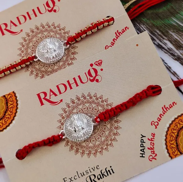 Silver_Ganesh_Lotus_Charm_Red_Thread_Rakhi_(Single_piece)