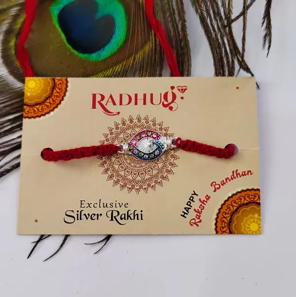 Pack_Of_1_Red_Thread_Silver_Peacock_Motif_Charm_Rakhi