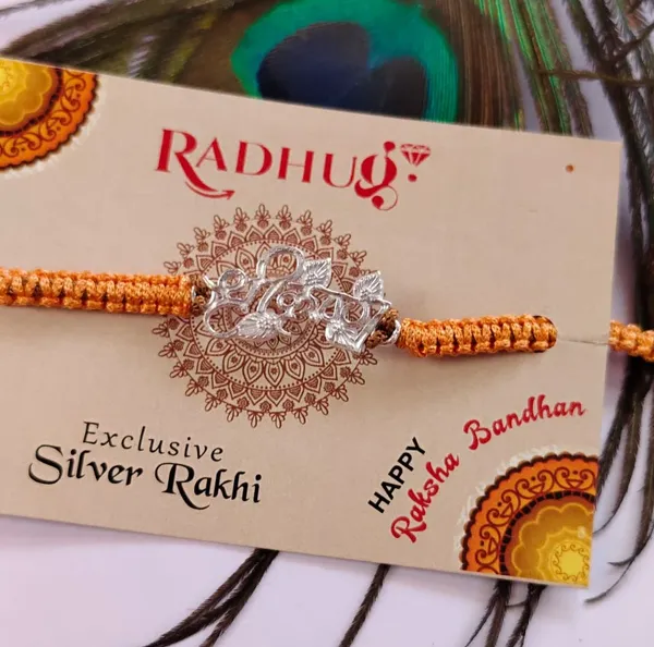 Pack_Of_1_Silver_Shree_Krishna_Charm_Orange_Thread_Rakhi