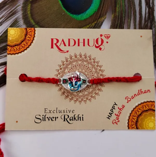Pack_Of_1_Silver_Blessing_Ganesh_Enamel_Charm_Red_Thread_Rakhi