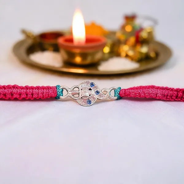 Pack_Of_1_Silver_Trishul_Damru_Charm_Pink_Blue_Braided_Thread_Rakhi