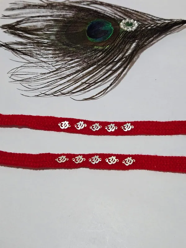 Pack_Of_1_Silver_Om_Charm_Rakhi_With_Red_Braided_Thread