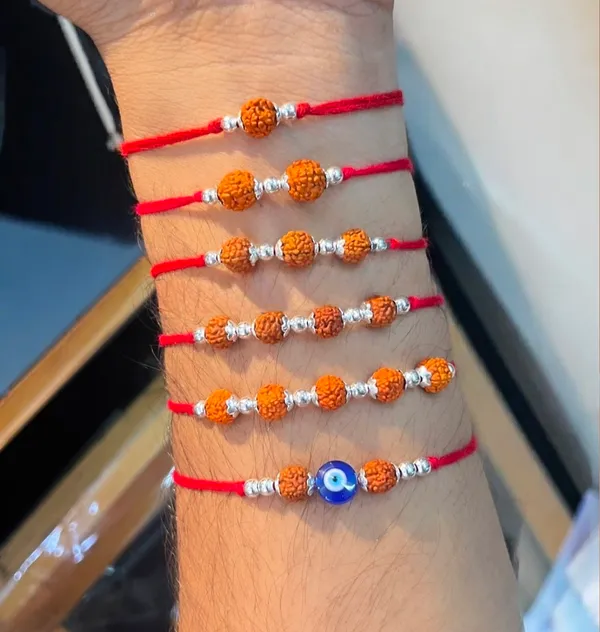 Pack_Of_6_92.5_Silver_Rudraksha_Evil_Eye_Red_Cotton_Thread_Rakhi_Combo