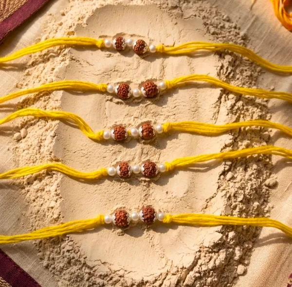 Pack_Of_5_Silver_Capped_Twin_Rudraksha_Pearl_Yellow_Thread_Rakhi