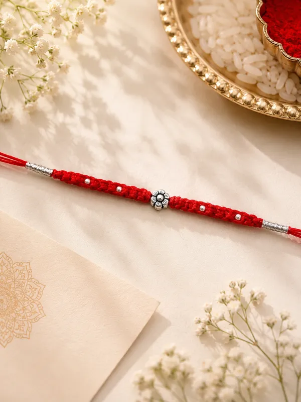 Pack_Of_1_925_Silver_Antique_Flower_Motif_Red_Mauli_Zari_Dori_Rakhi