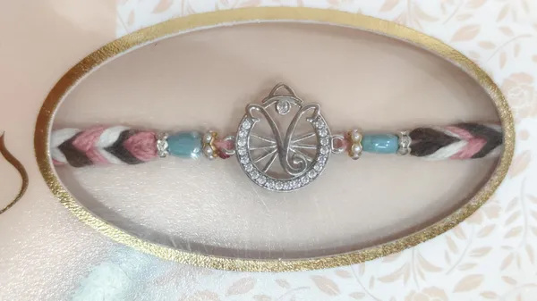 Pack_Of_1_925_Sterling_Silver_Ganesh_Charm_Pearl_Cotton_Thread_Rakhi