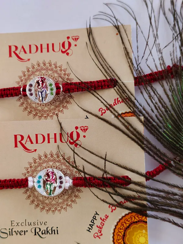 Silver_Ganesha_Charm_Red_Thread_Rakhi_(pack_of_1_rakhi)