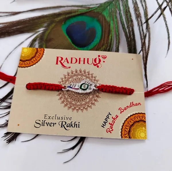Pack_Of_1_Sterling_Silver_Mor_Pankh_Charm_Red_Thread_Rakhi