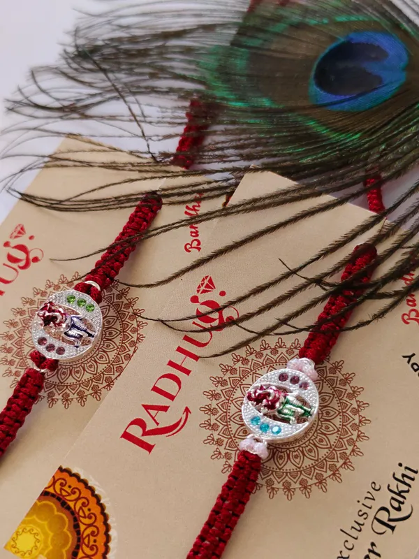 Silver_Ganesha_Charm_Red_Thread_Rakhi_(pack_of_1_rakhi)
