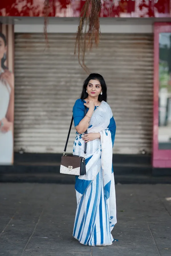 White_And_Blue_Premium_Linen_With_Exclusive_Digital_Print_And_Jalar_Craft_Saree_For_Women