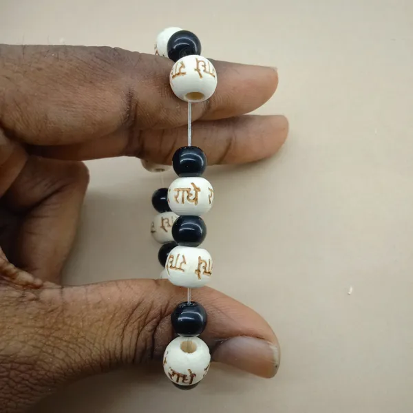 Radhe_Radhe_Engraved_Wooden_Beads_Bracelet_For_Men_And_Women,_Couple_Pack_Of_2_Black_And_White_Crystal_Combo_Hare_Krishna_Devotional_Bhakti_Stretchable_Spiritual_Wrist_Bracelet