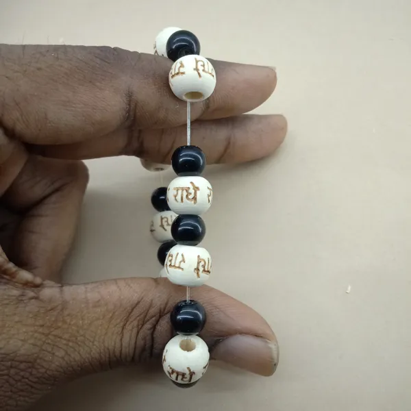 Radhe_Radhe_Engraved_Wooden_Beads_Bracelet_For_Men_And_Women,_Couple_Pack_Of_2_Black_And_White_Crystal_Combo_Hare_Krishna_Devotional_Bhakti_Stretchable_Spiritual_Wrist_Bracelet