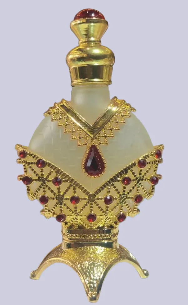 Decorative_Attar_Bottle_With_Golden_Filigree_And_Ruby_Gemstones_For_Unsiex