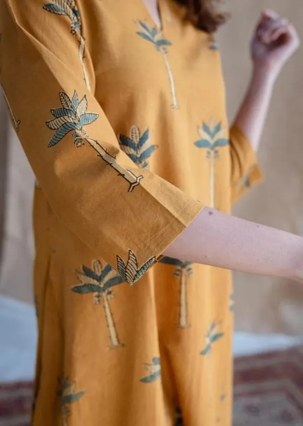 Mustard_Yellow_Floral_Print_Aline_Kurta_With_White_Palazzo_Set