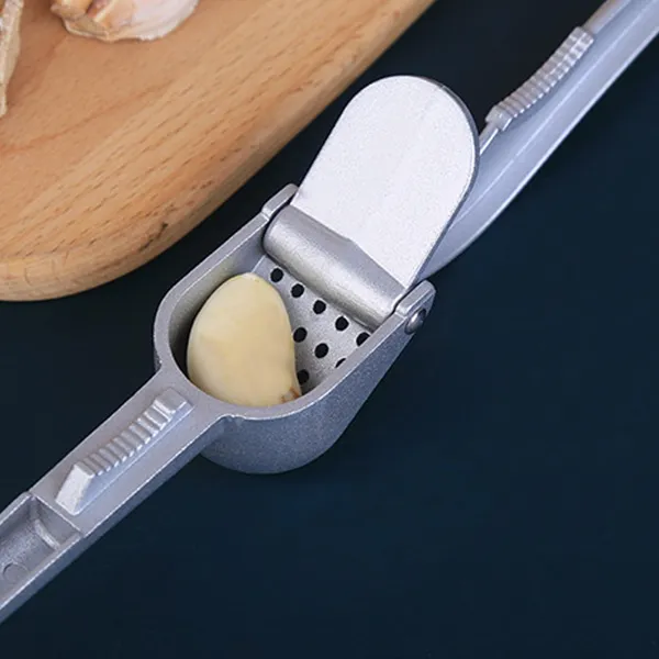 Silver_Garlic_Press_All_Aluminum_Easy_To_Use_With_Light_Weight_Without_Difficulty_Cooking_Baking_And_Kitchen_Tool_And_Dishwasher_Safe