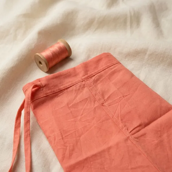 Coral_Pink_100%_Cotton_Premium_and_Elegant_Peti_Soft_Petticoat_(Measurements:_Waist_–_42_inches_|_Hips_–_48_inches_|_Length_–_38_inches_|_Bottom_Ghera_–_74_inches)