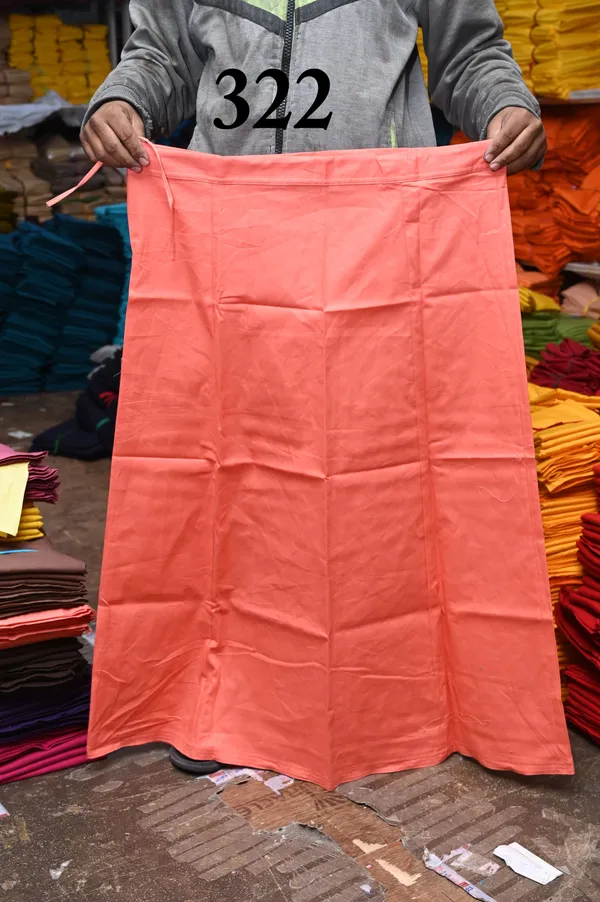 Coral_Pink_100%_Cotton_Premium_and_Elegant_Peti_Soft_Petticoat_(Measurements:_Waist_–_42_inches_|_Hips_–_48_inches_|_Length_–_38_inches_|_Bottom_Ghera_–_74_inches)
