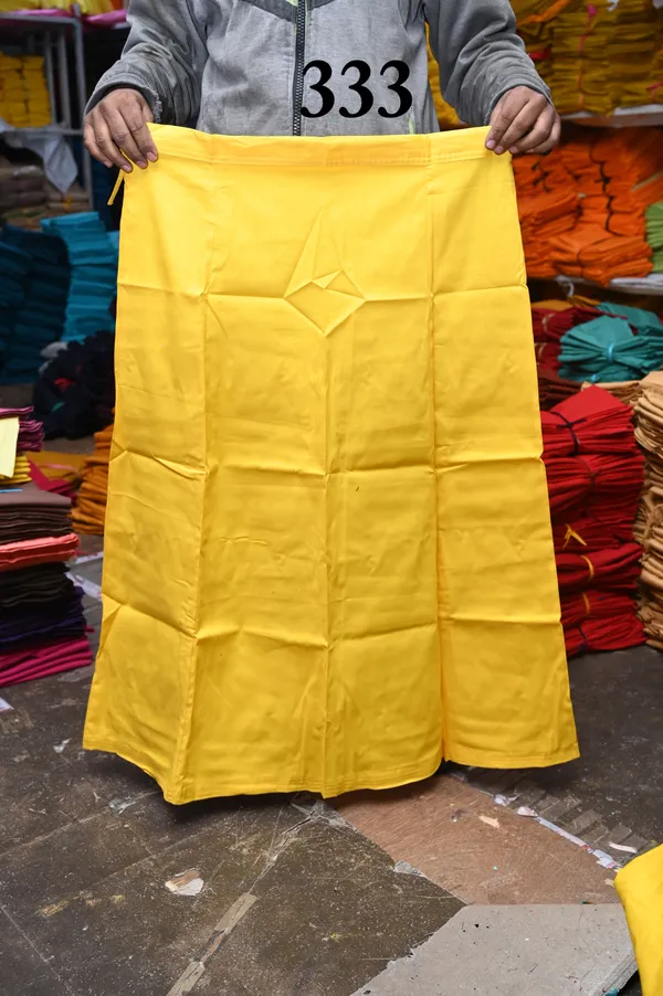 Bright_Yellow_100%_Cotton_Premium_and_Elegant_Peti_Soft_Petticoat_(Measurements:_Waist_–_42_inches_|_Hips_–_48_inches_|_Length_–_38_inches_|_Bottom_Ghera_–_74_inches)_333