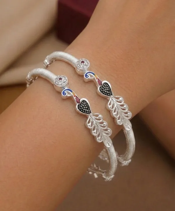 Combo_Of_Peacock_Diamond_Studded_Bangles_–_Gold_&_Silver_Plated_(Set_of_4)