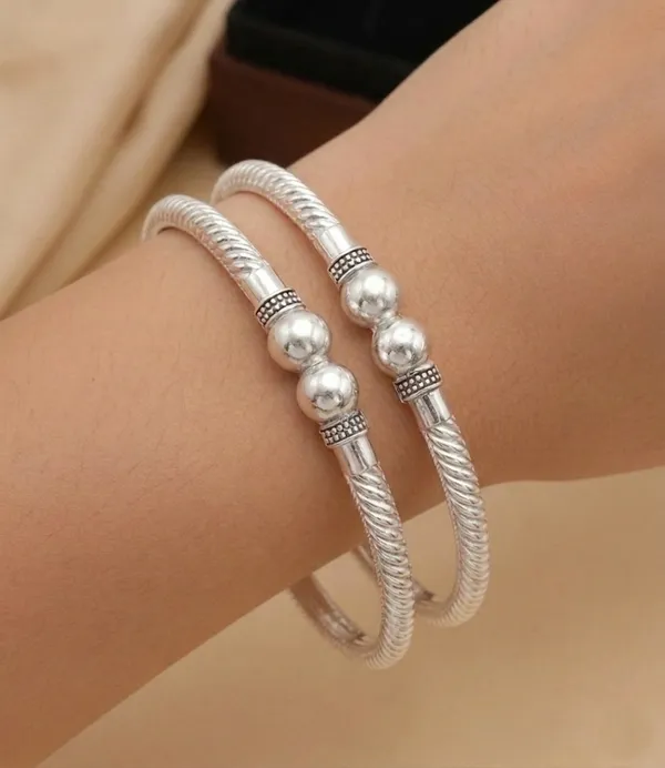 Combo_of_Oxidise__Kada_bangles_for_Women_–_Gold_&_Silver_Plated_(Set_of_4)