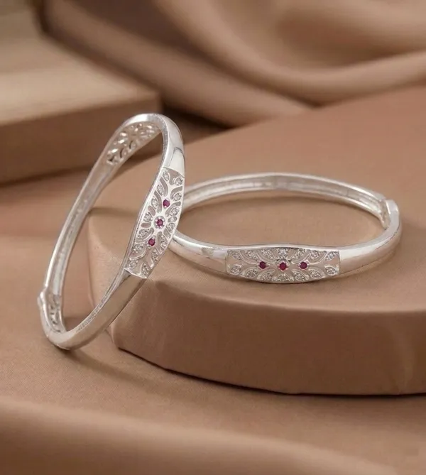 Elegant_Silver_Plated_Floral_Cutwork_Bangles_with_Ruby_Stone_Detailing