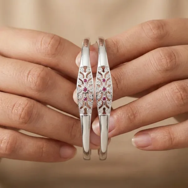 Elegant_Silver_Plated_Floral_Cutwork_Bangles_with_Ruby_Stone_Detailing