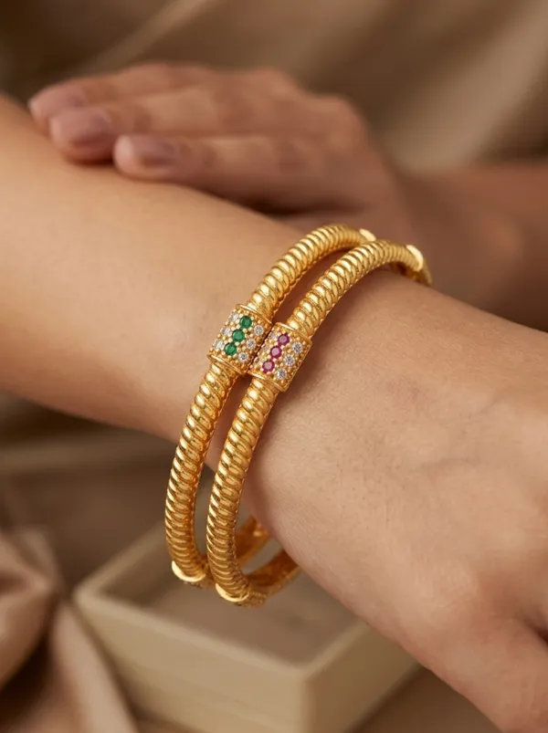 Spiral_Gold_Bangles_with_Multicolor_Stone_Accents_–_Pack_of_2