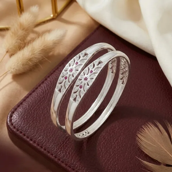 Elegant_Silver_Plated_Floral_Cutwork_Bangles_with_Ruby_Stone_Detailing