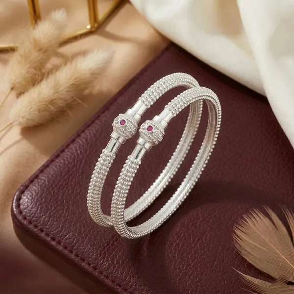 Elegant_Silver_Kada_style_bangle_with_Ruby_Accent_(Set_of_2)
