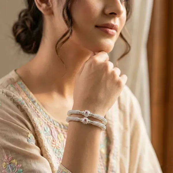 Elegant_Silver_Kada_style_bangle_with_Ruby_Accent_(Set_of_2)
