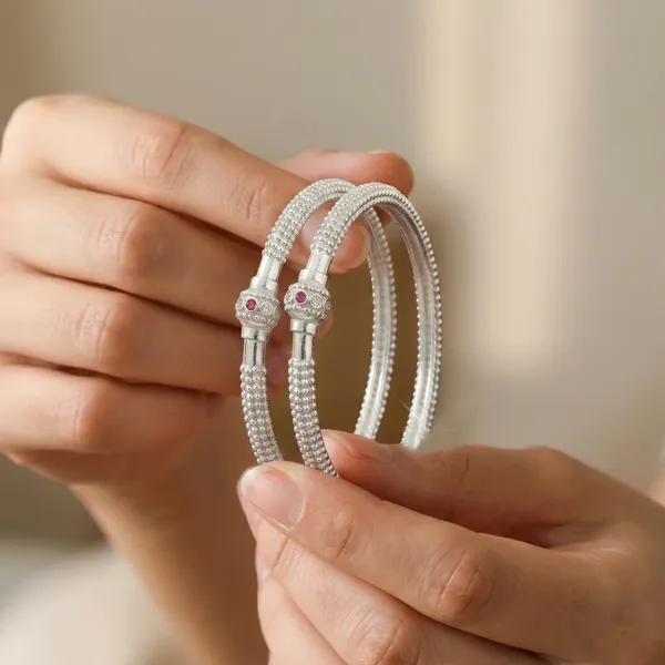 Elegant_Silver_Kada_style_bangle_with_Ruby_Accent_(Set_of_2)