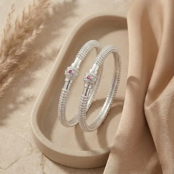 Elegant_Silver_Kada_style_bangle_with_Ruby_Accent_(Set_of_2)