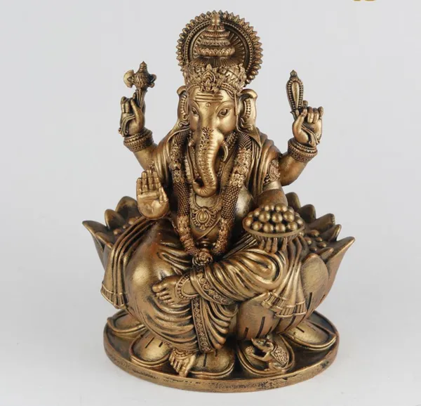 Gold_Traditional_Brass_Peacock_Oil_Lamp_Set_And_Lord_Ganesha_Idol_Pack_Of_2