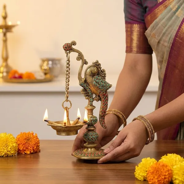 Gold_Brass_Peacock_Diya_Stand_With_Hanging_Chain_Oil_Lamp