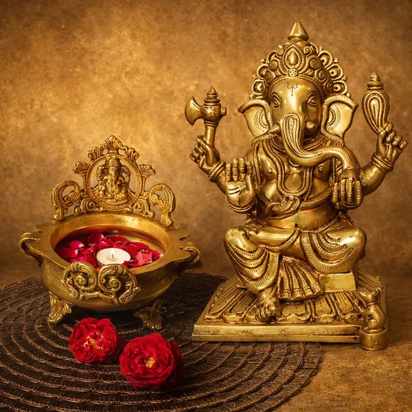Gold_Decorative_Brass_Urli_Bowl_With_Ganesha_Design_Floating_Candle_Holder_And_Lord_Ganesha_Idol_Pack_Of_2