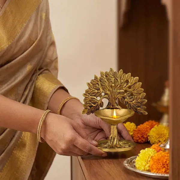 Gold_Brass_Tree_Of_Life_Decorative_Diya_Stand_With_Oil_Lamp_And_Ganesh_Idol_Pack_Of_2
