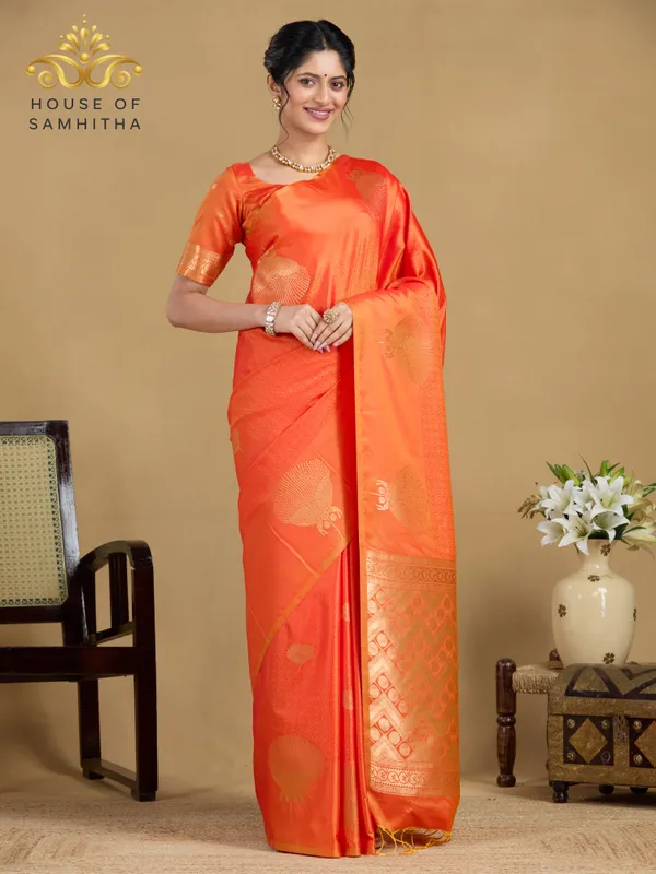 Radiant_Orange_Semi-Soft_Silk_Saree_With_Antique_Gold_Floral_Tree_Buttas