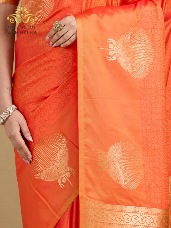 Radiant_Orange_Semi-Soft_Silk_Saree_With_Antique_Gold_Floral_Tree_Buttas
