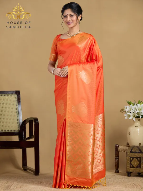 Radiant_Orange_Semi-Soft_Silk_Saree_With_Antique_Gold_Floral_Tree_Buttas