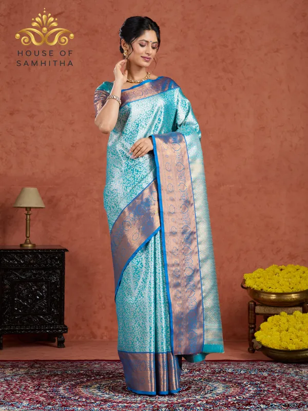 Aqua_Blue_Tissue_Brocade_Semi-Kanchi_Pattu_Saree_With_Royal_Blue_Contrast_Border